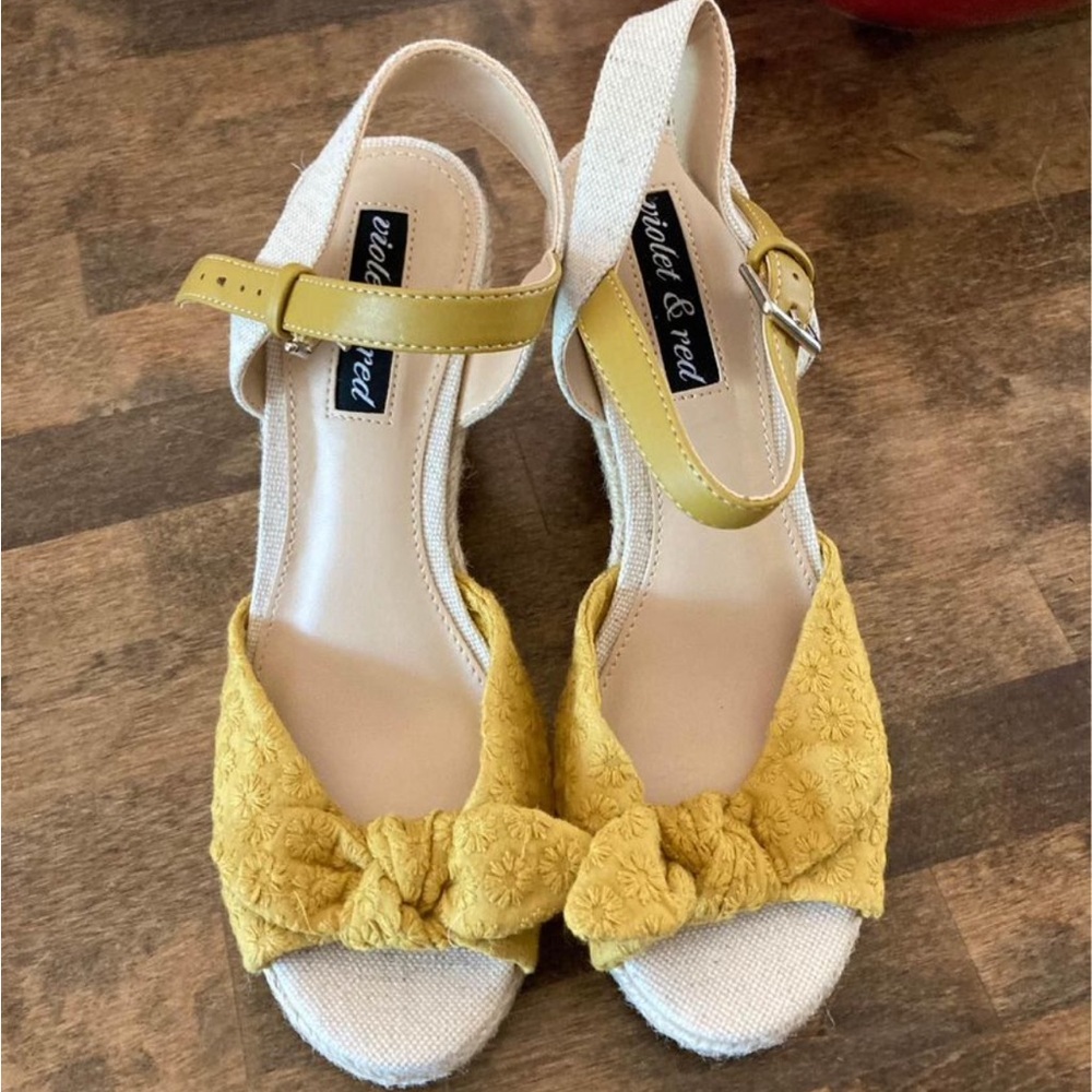 Cute yellow and straw wedges. Size 6. Never worn.